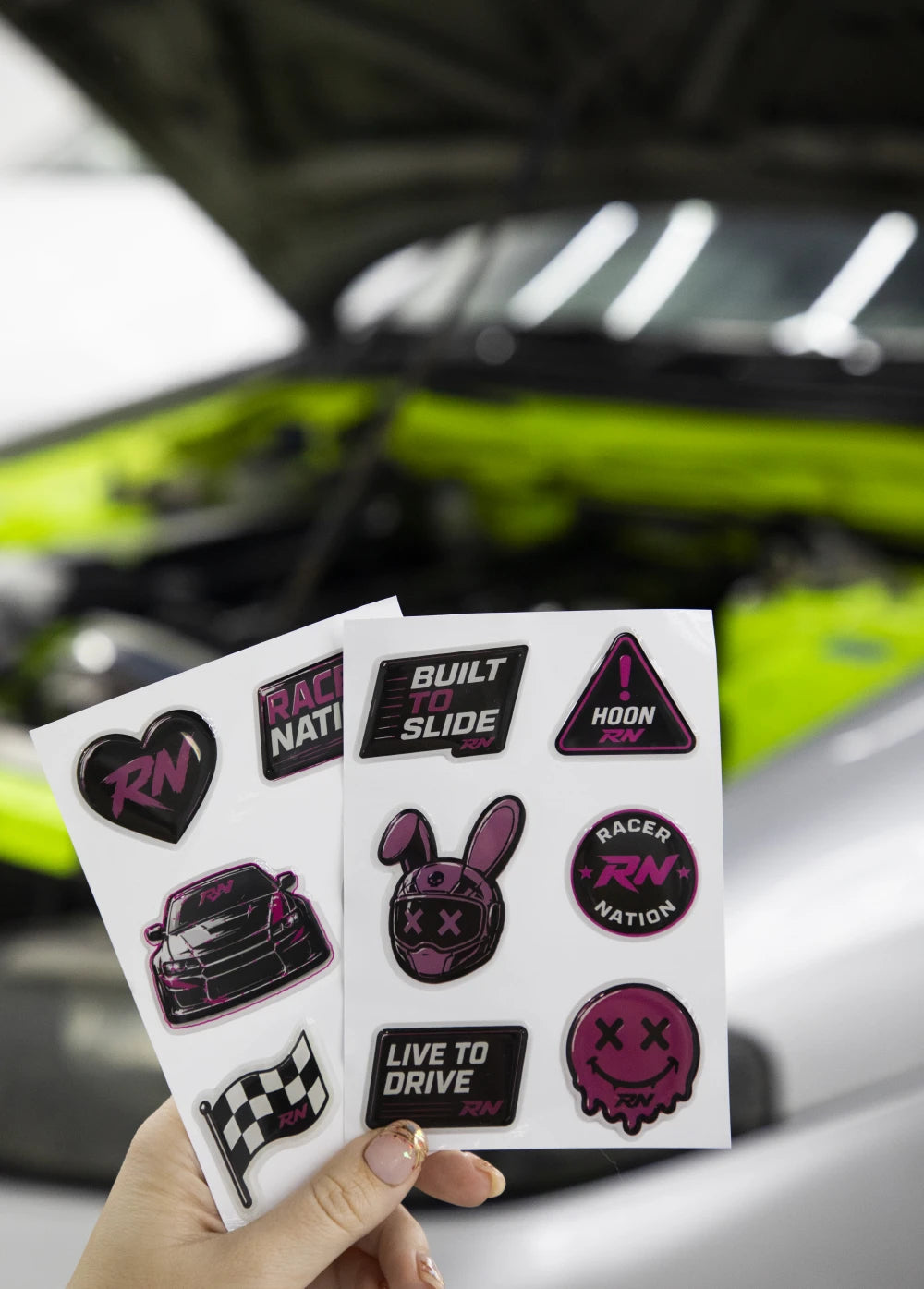 Racer Nation 3D puff sticker pack with raised car stickers, logo stickers and pink graphic designs.