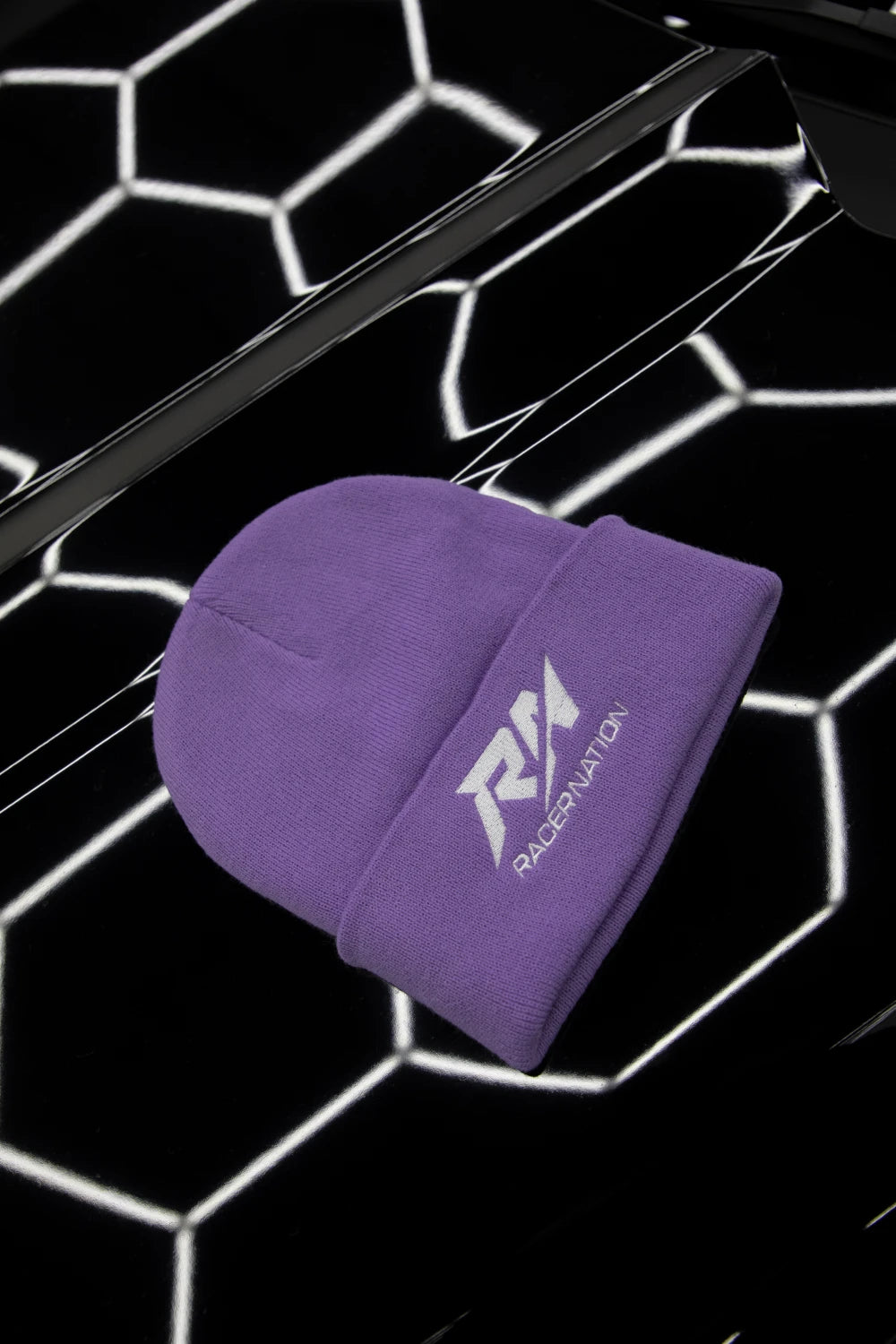 Purple Racer Nation embroidered beanie featuring the white RN logo on the front.